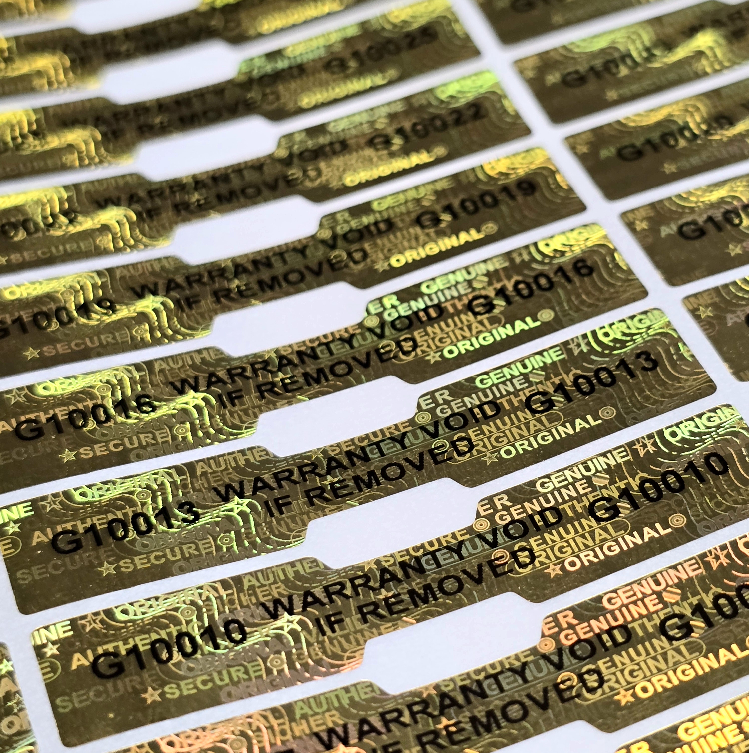 3D Hologramm Aufkleber Garantie 10x50 mm mit lfd. Nummer Silber/Gold 3D Hologramm Aufkleber Garantie 10x50 mm mit lfd. Nummer Silber/Gold